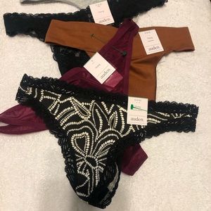 5, size small, new Auden thongs in a variety of colors and materials.